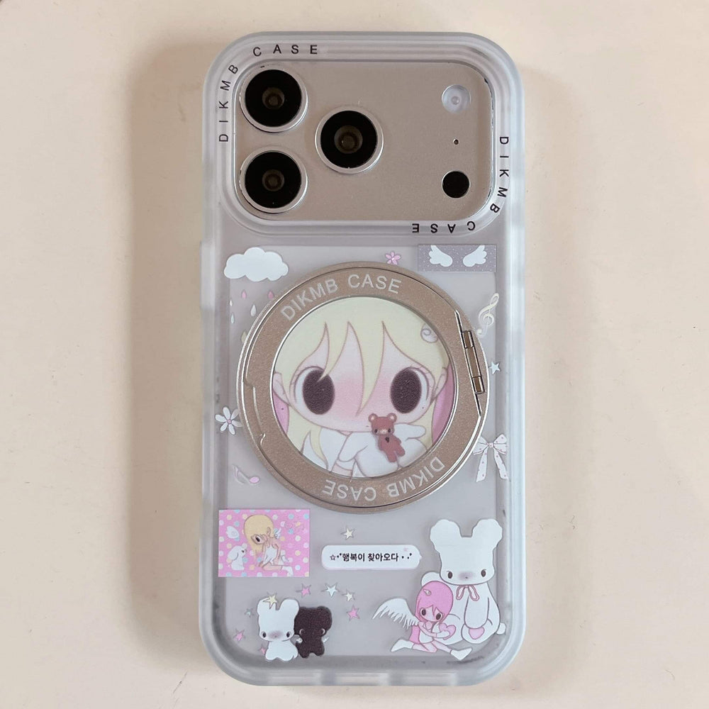 A clear Y2K anime phone case propped up horizontally on a wooden desk using its open silver ring stand.