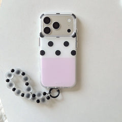 Pink black polka dot iPhone case front view with lanyard