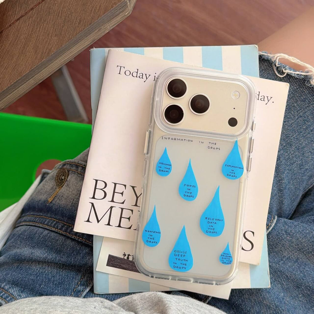 Blue raindrop clear phone case on books