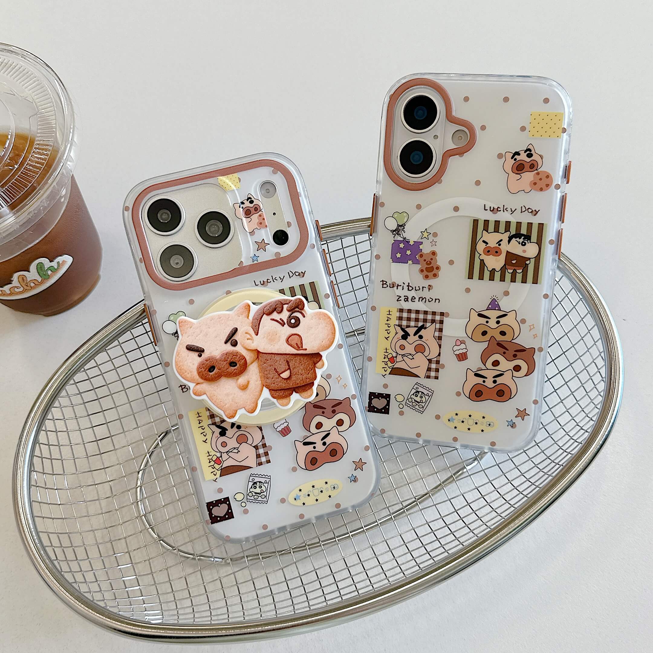 Two cartoon pig iPhone cases displayed with and without a matching grip.