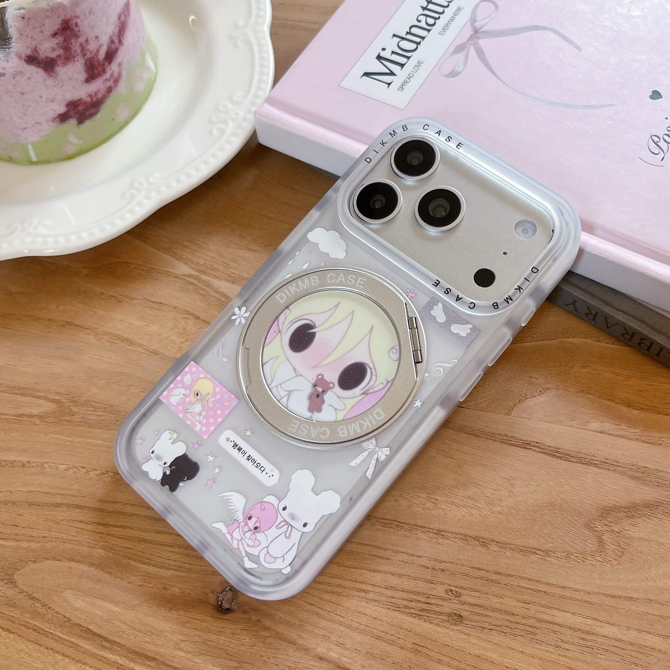 Hand holding a coquette aesthetic anime phone case featuring a protective clear bumper frame.