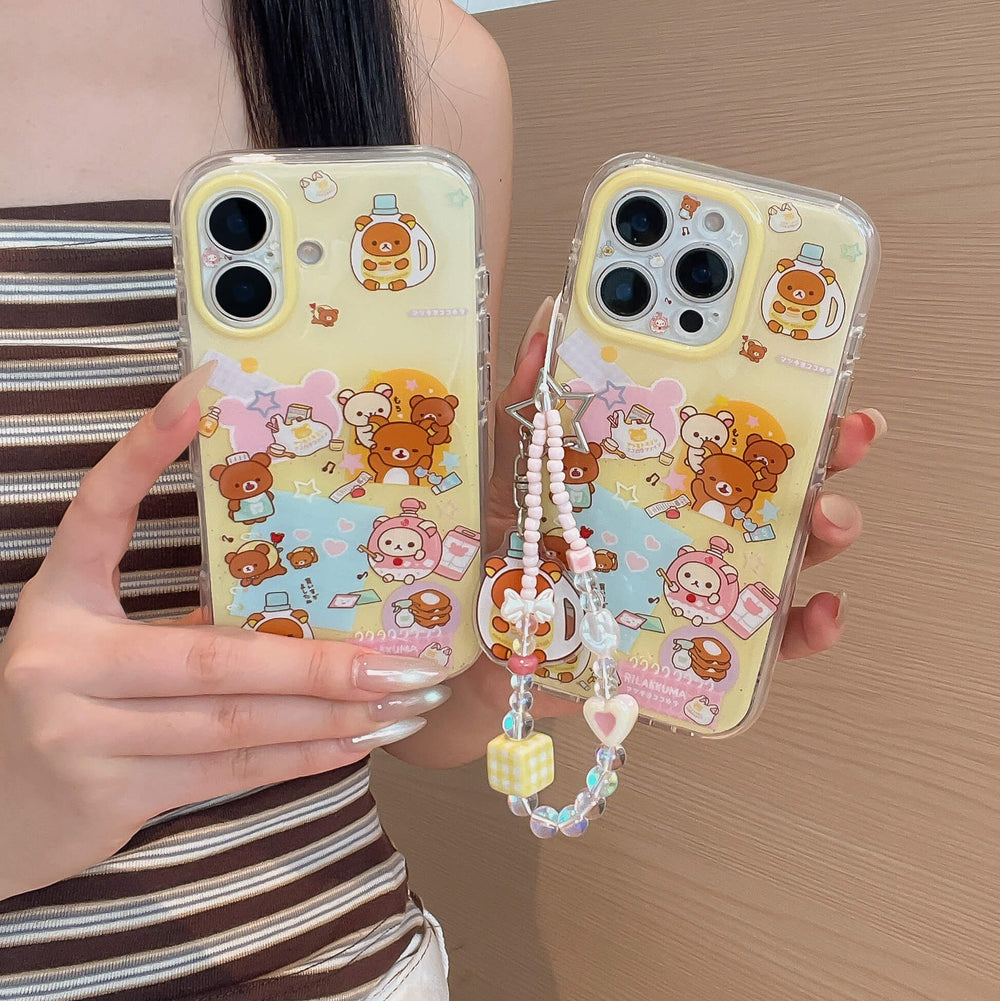 A pair of cute pastel yellow cartoon bear phone cases held together, showing both dual-camera and triple-camera setups.