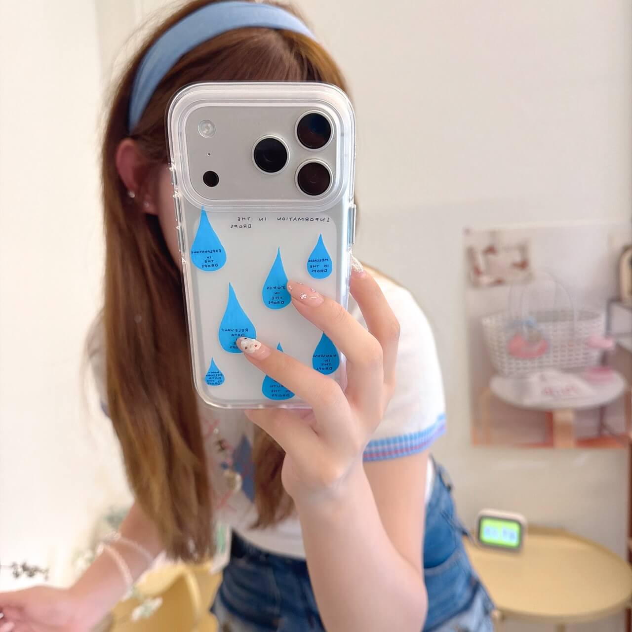 Cute blue raindrop clear iPhone case lifestyle photo