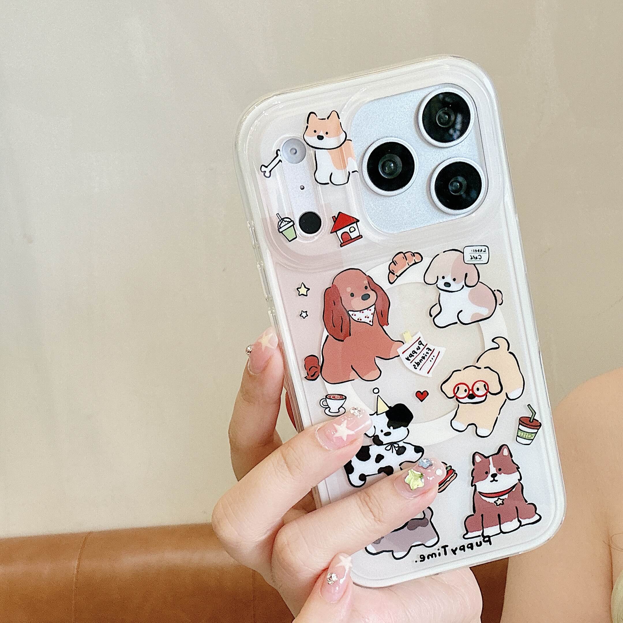 Hand holding a clear cute cartoon dog iPhone case with colorful puppy print.
