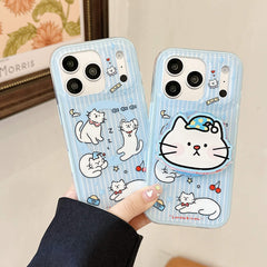 Handheld clear blue iPhone case with white cartoon cats.