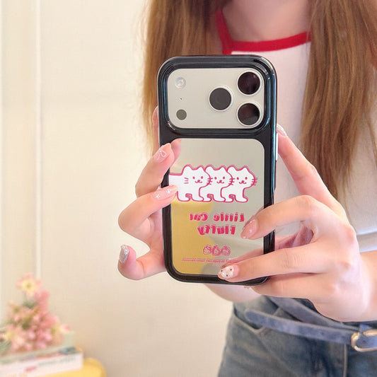 Girl holding a cute pink fluffy cat mirror iPhone case with a sleek protective black bumper frame.
