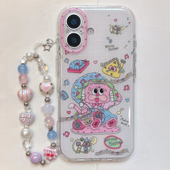 Flat lay of a cute pink kitten phone case next to a pastel colorful beaded charm lanyard.