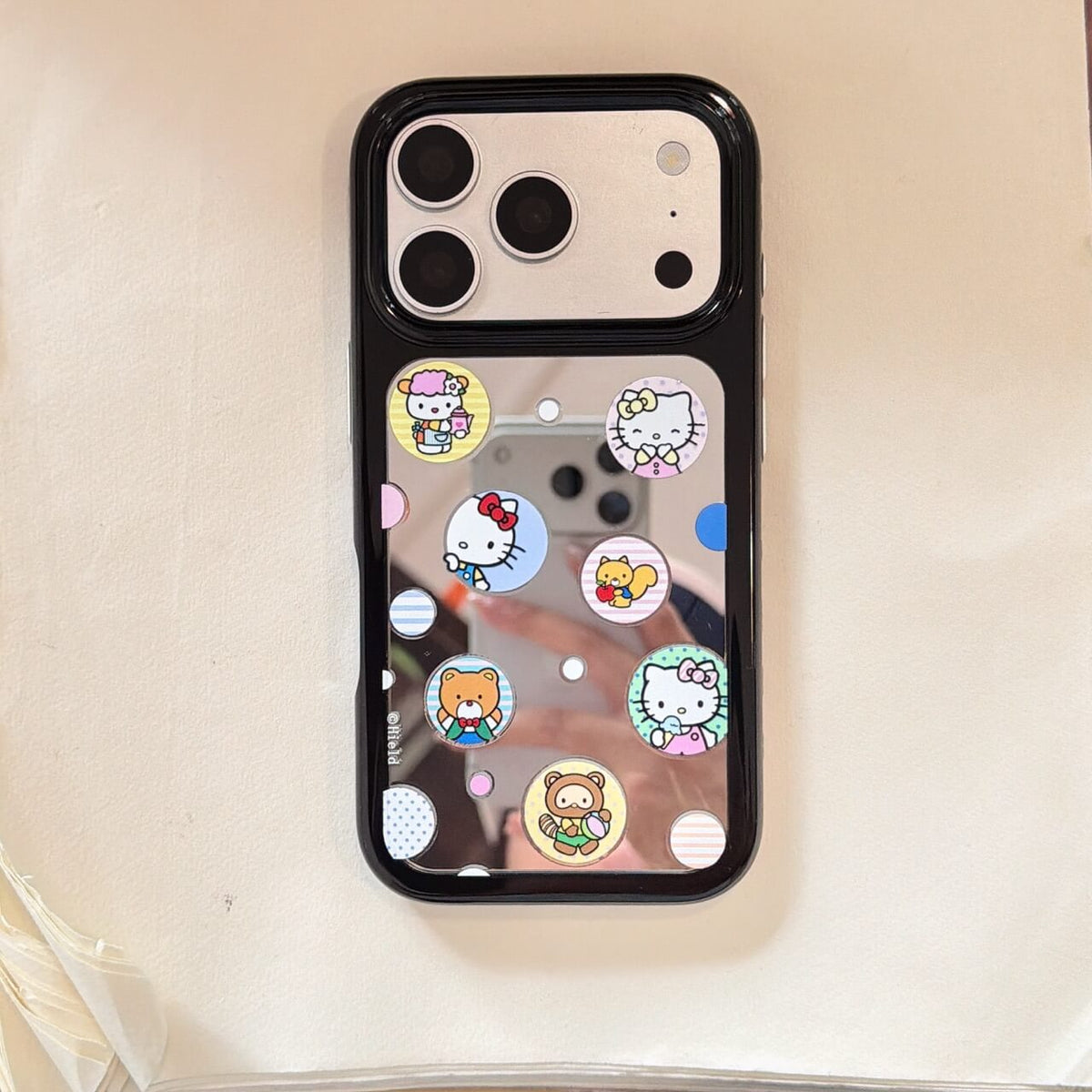 Cute kitty sticker mirror iPhone case with black bumper on white background