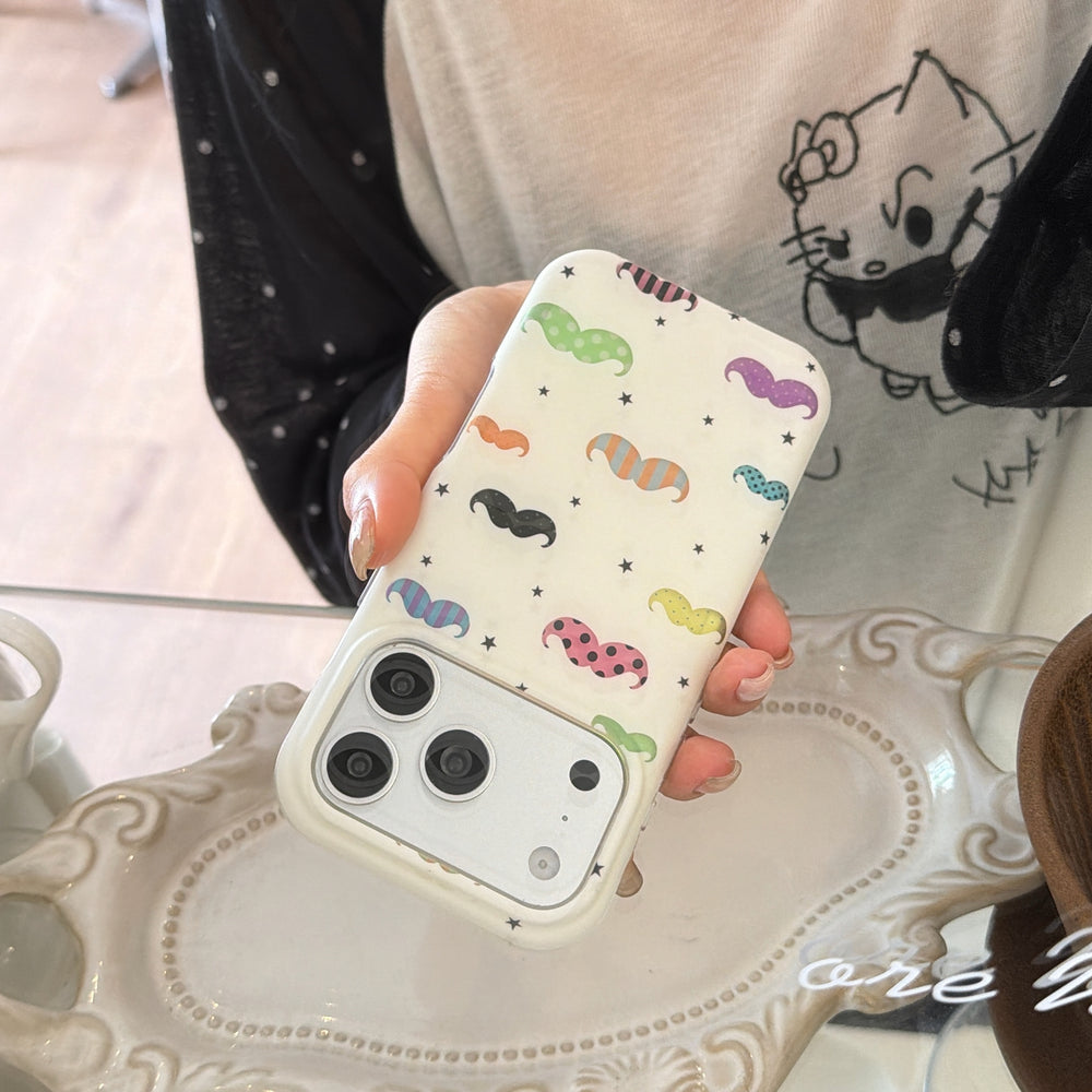 A hand tilting a cute mustache iPhone case over a white decorative tray.