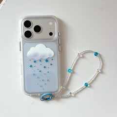 A mirror selfie of a girl with a blue headband holding the cute Y2K cloud and star pattern phone case.