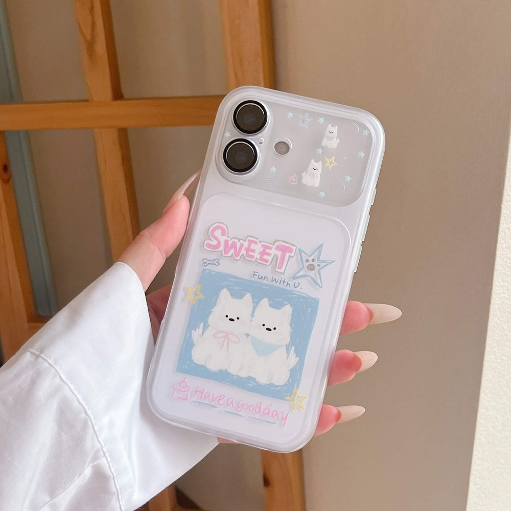 Hand holding a dual-camera cute cartoon dog phone case against a warm wooden background.