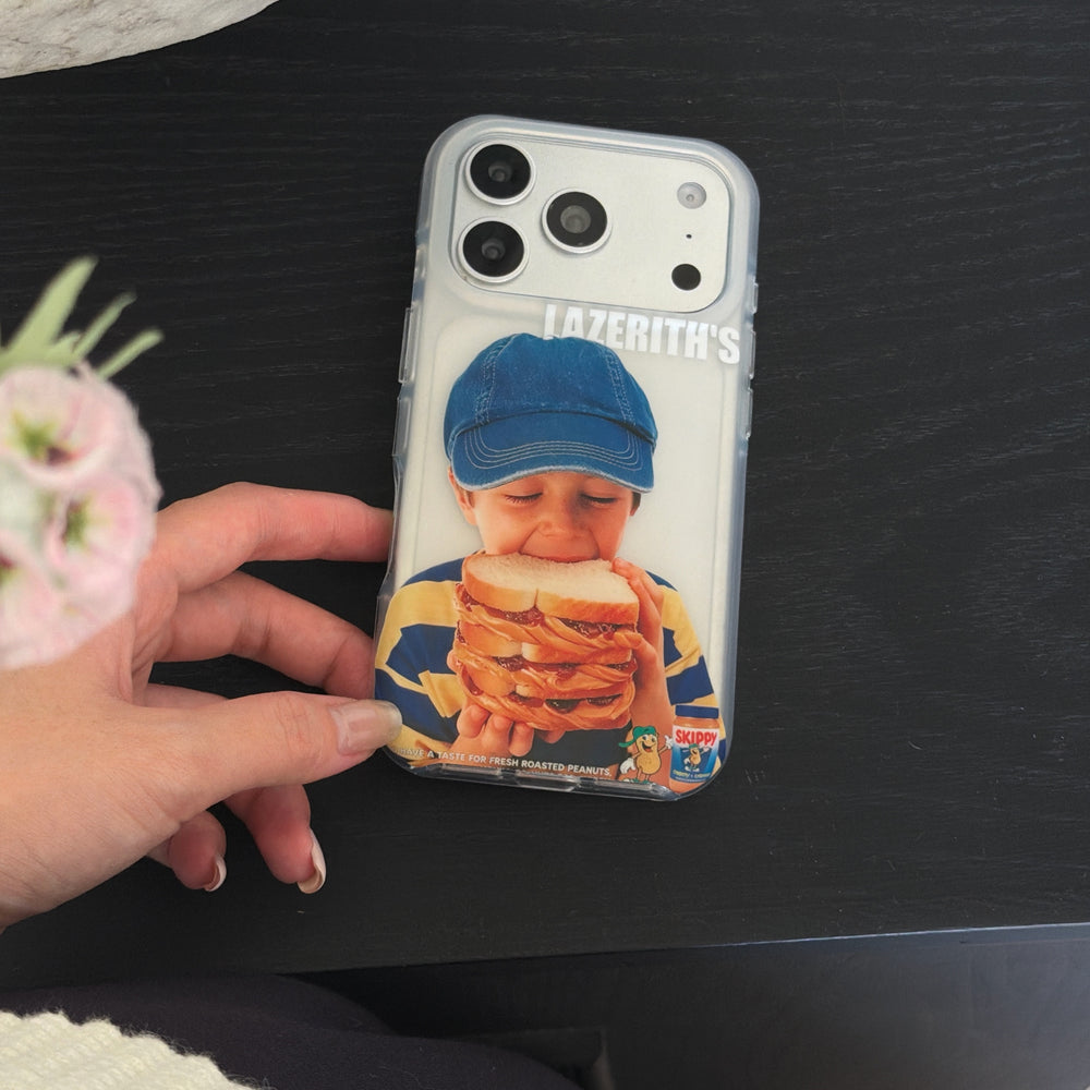 A hand touching a funny boy sandwich clear iPhone case on a black table with a pink flower.