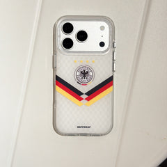 Product flatlay of the silver Germany national team mirror iPhone case on a clean textured surface.