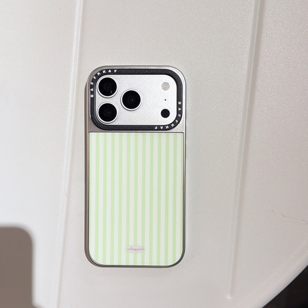 Studio product view of the green striped iPhone case with a silver camera protector on a white background.