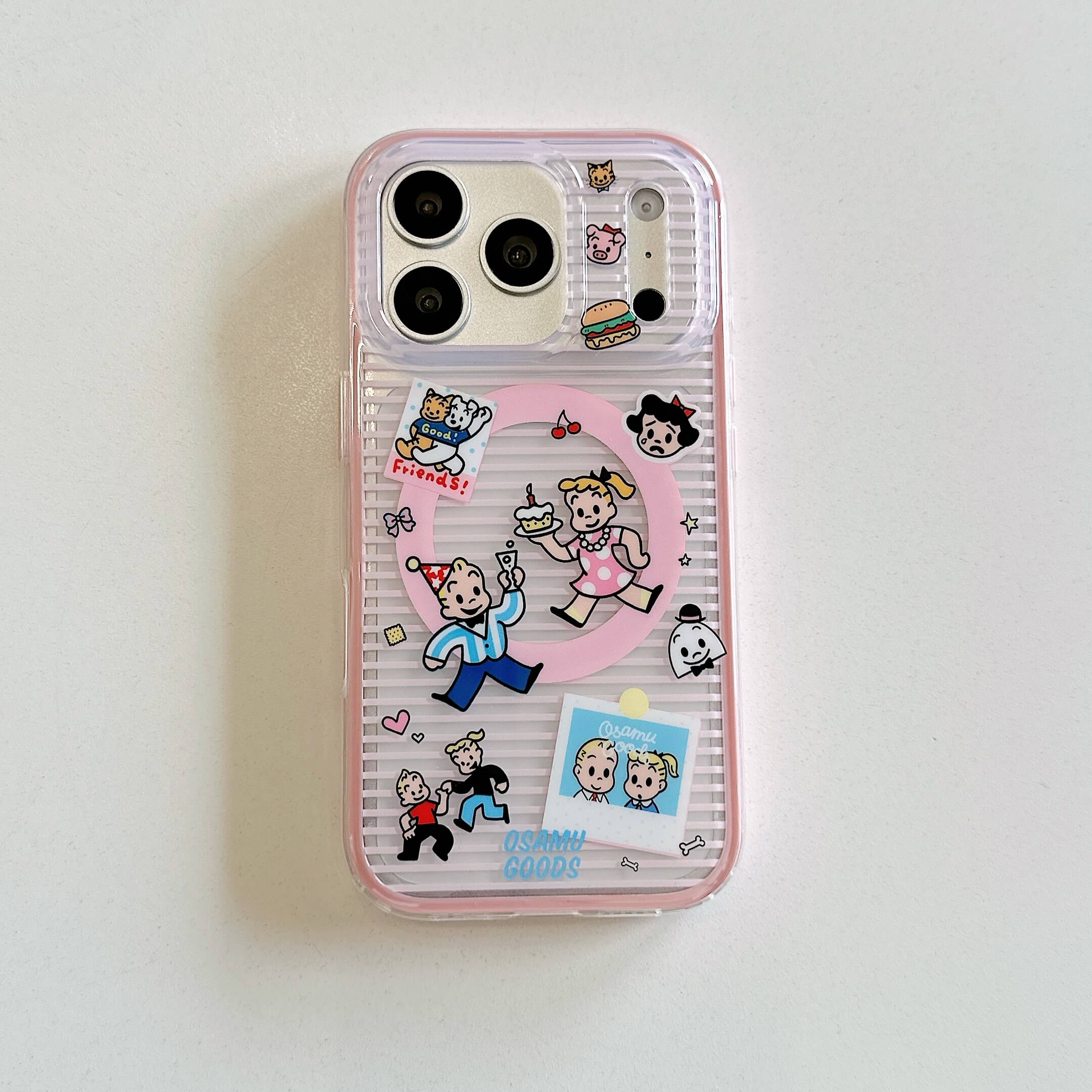 Close-up of a pink heart-shaped cartoon phone grip accessory.