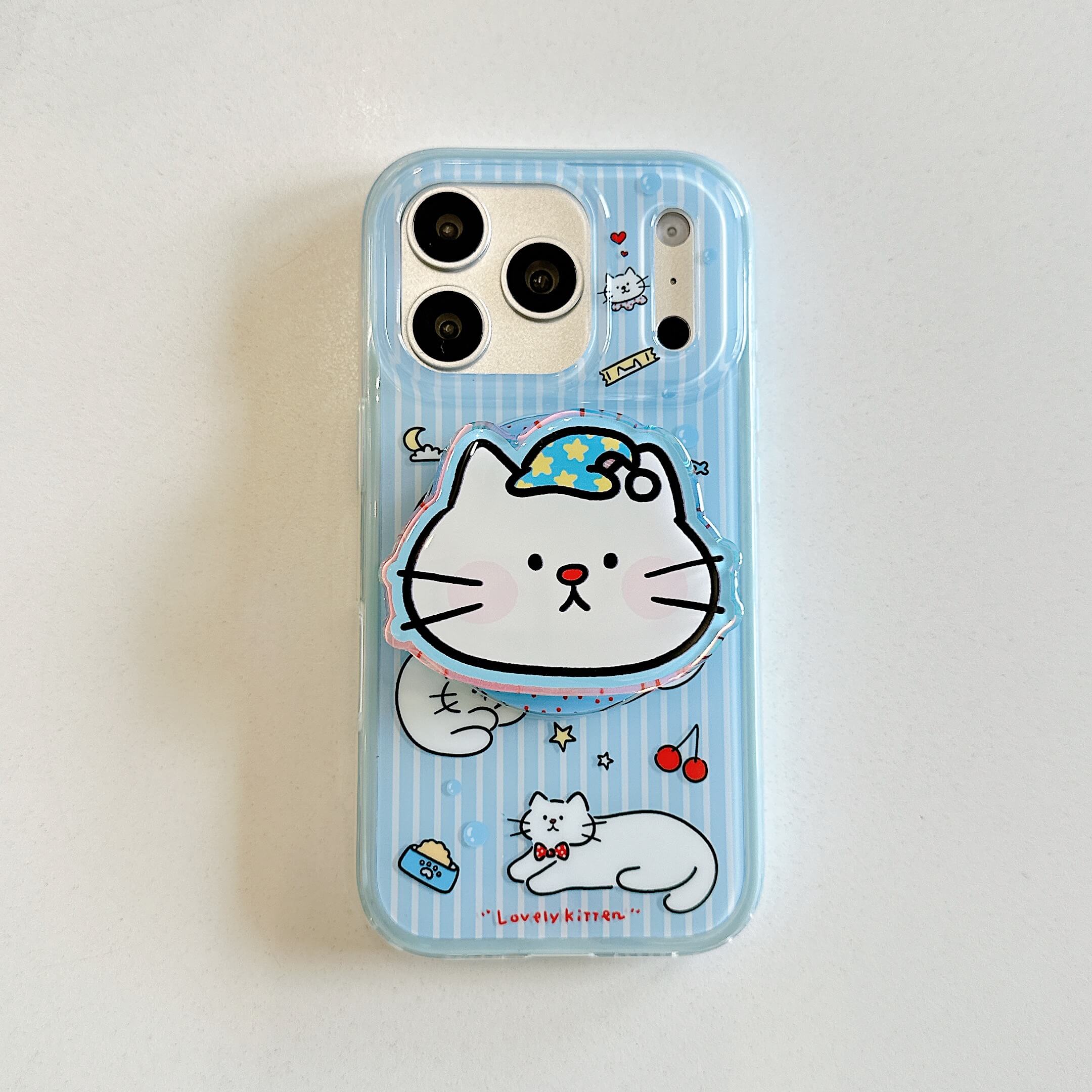Two blue kawaii cat iPhone cases with and without grip.