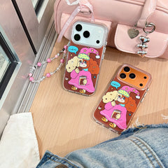 Two kawaii dog eating cookies phone covers displayed on a wooden desk next to a pastel pink handbag.