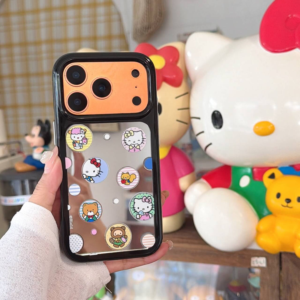 Kawaii kitty sticker iPhone case with black bumper in a lifestyle setting