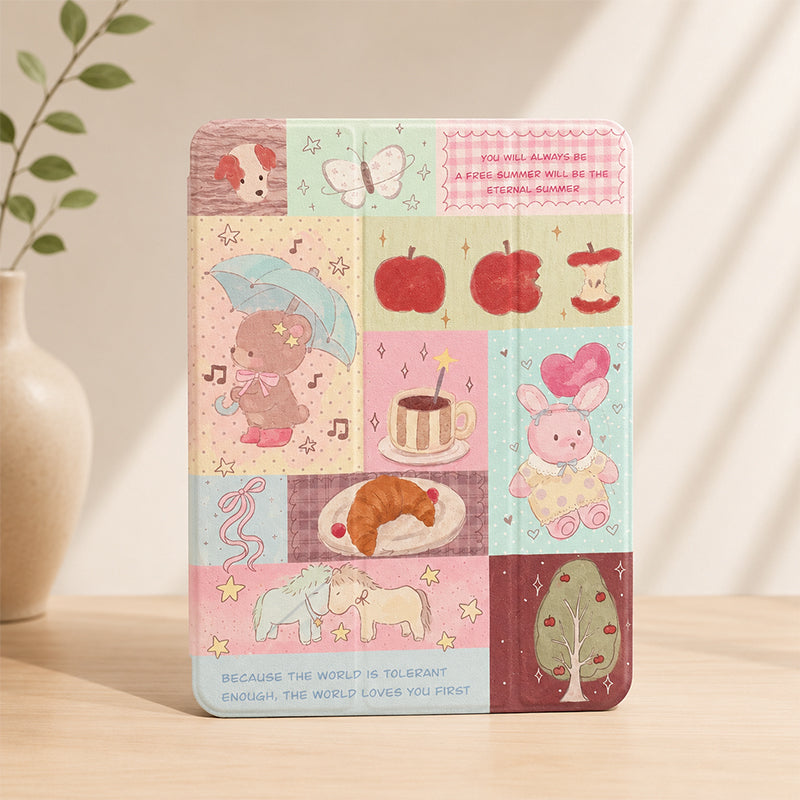 Kawaii teddy bear patchwork iPad case standing upright on a light wooden desk next to a white ceramic vase with green leaves.
