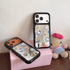 Cute kitty sticker mirror iPhone cases displayed with plush decor