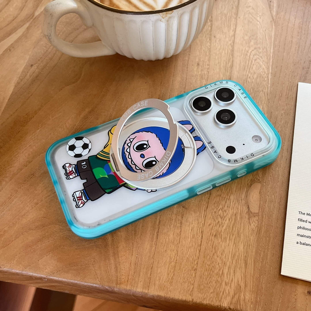 A Labubu cartoon phone case lying flat on a wooden coffee table next to a cup of hot latte.