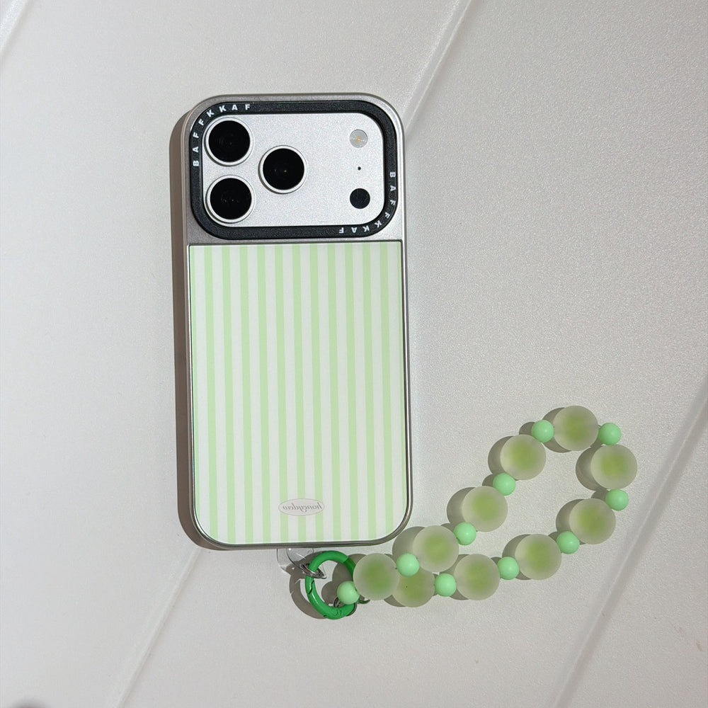 Product shot of the minimalist green striped phone case and beaded wrist strap on a clean white background.