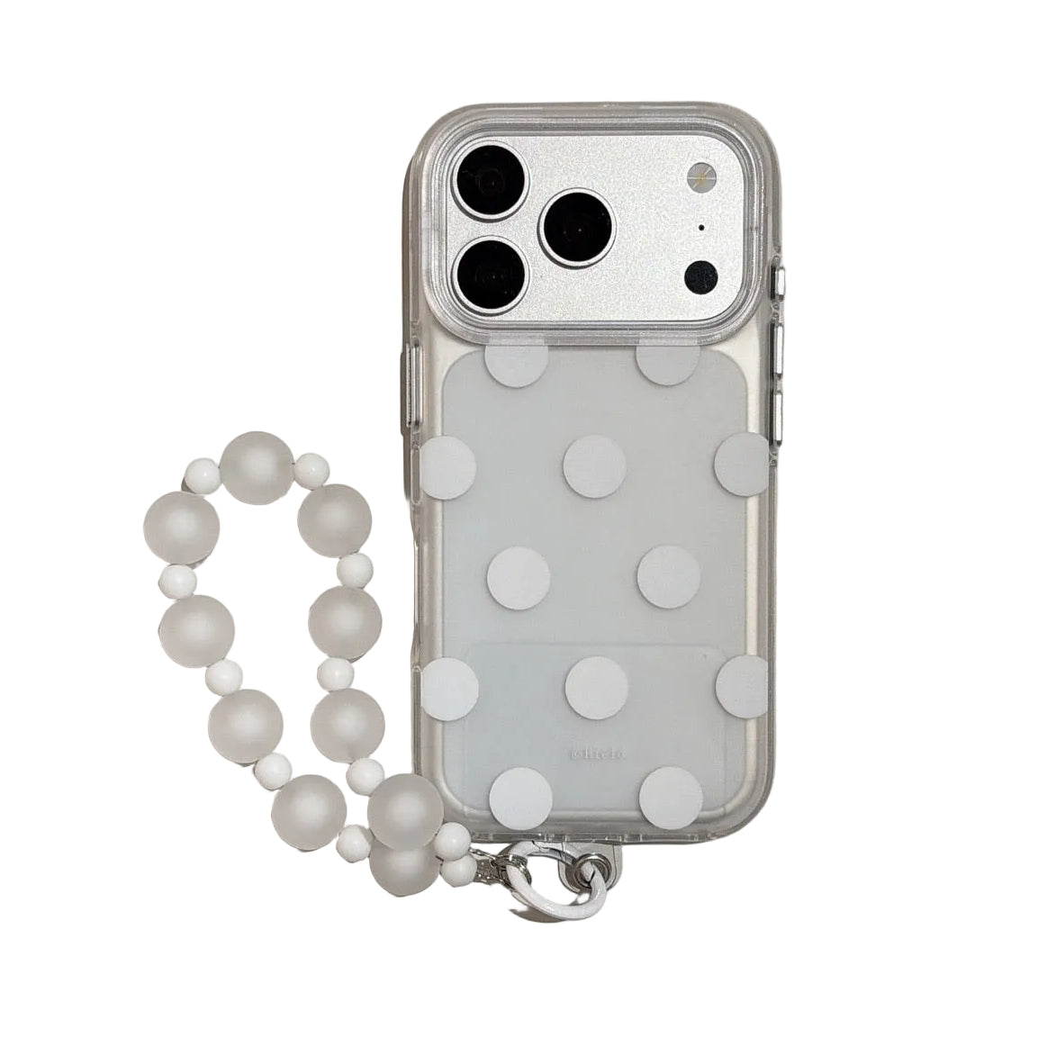 Studio view of a minimalist white polka dot transparent iPhone case featuring a frosted white beaded hand charm.