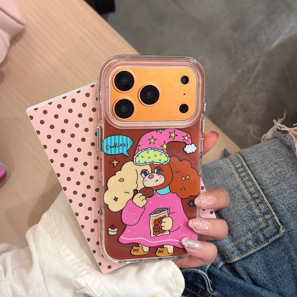 A close-up of a hand holding the orange metallic camera frame cartoon dog case against a pink polka dot card.