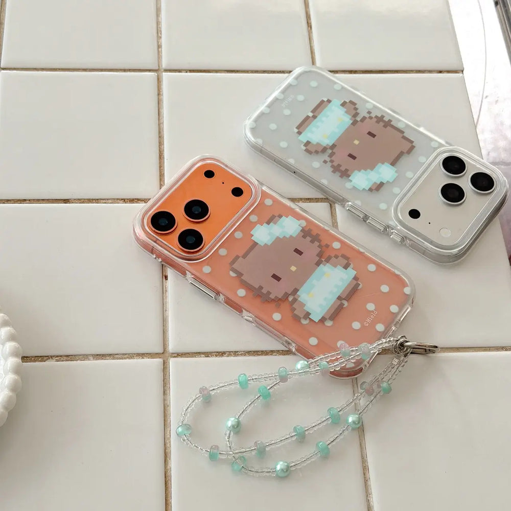 Two pixel kitty polka dot iPhone cases with clear bumper and beaded strap