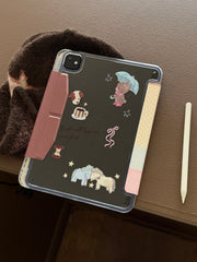 Close-up flat lay of the printed clear acrylic back panel of a cute iPad case with a pink magnetic flap next to a white stylus.