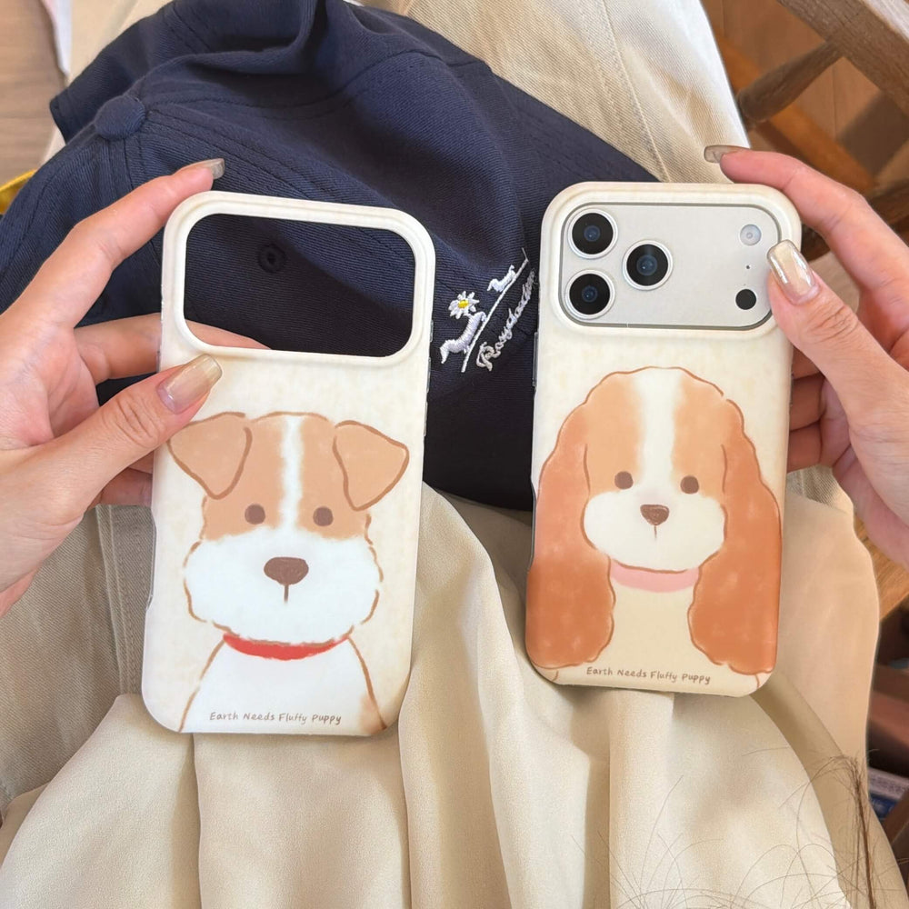 Close-up of two cute puppy iPhone cases with raised camera protection.