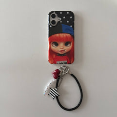Red-haired doll iPhone case with black wrist strap and striped star charm.