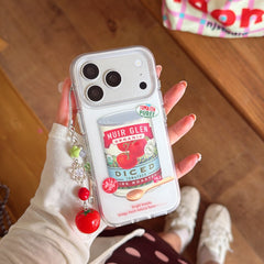 Top view of a person holding a retro tomato can iPhone case with a 3D tomato wrist strap charm.