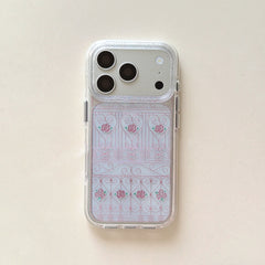 n isolated view of a silver clear glitter phone case featuring a pink rose fence pattern.