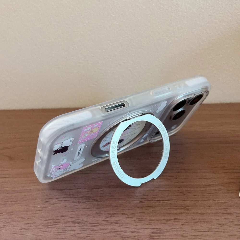Close-up of fingers holding a clear anime phone case using the built-in silver metal ring stand holder.