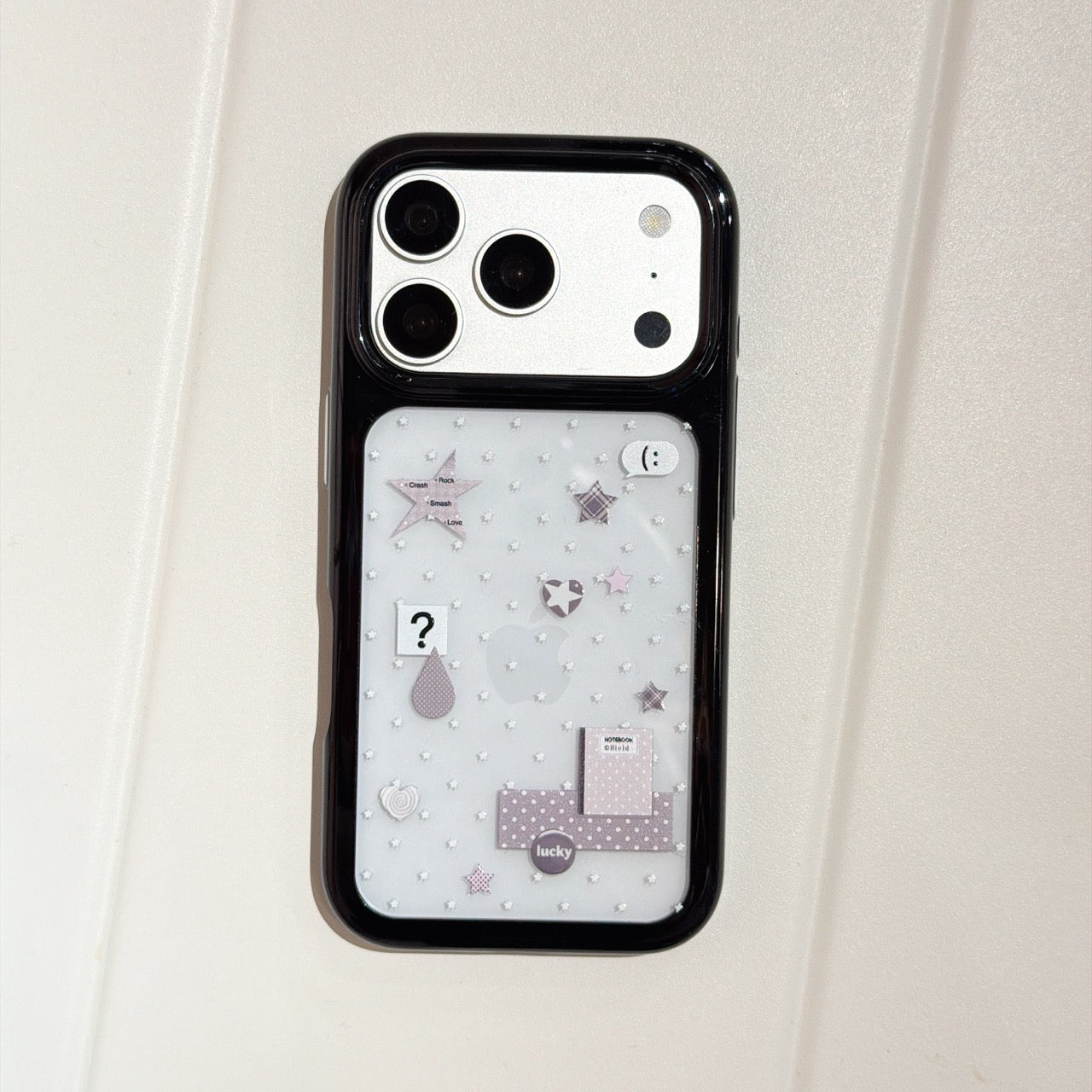 Product main view of the sweet cool star mirror iPhone case in silver with a shockproof black frame.