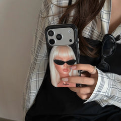 Woman holding a Y2K blonde girl iPhone case with a glossy black frame.