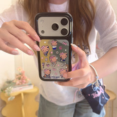 A close-up mirror selfie showing a silver-framed Hello Kitty mirror phone case and beautifully manicured nails.