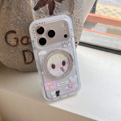 An aesthetic soft girl anime iPhone case lying flat on a light pink notebook.